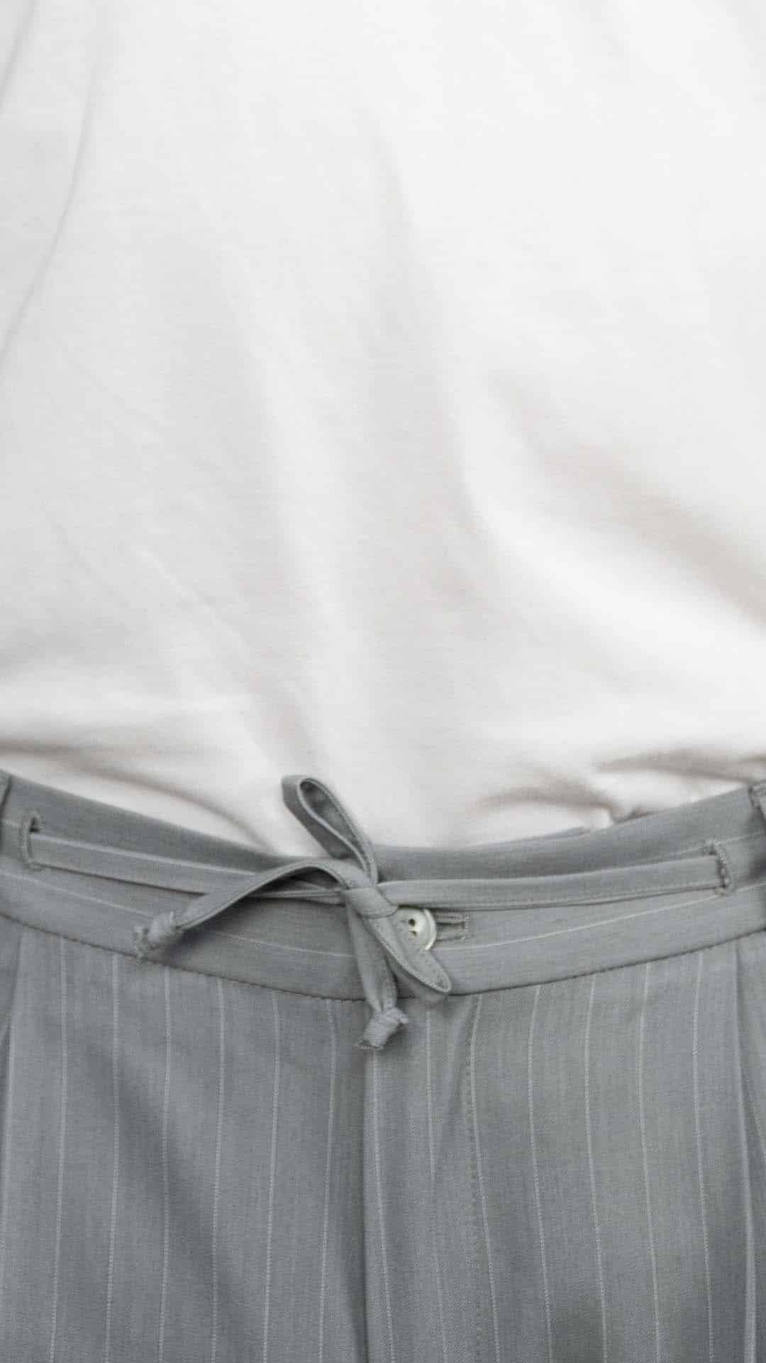 Calça travel riscas cinzentas